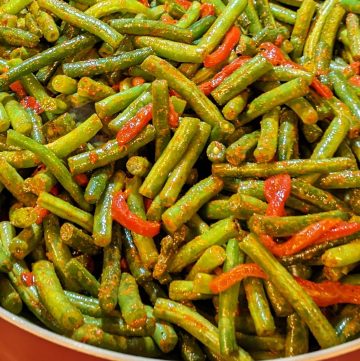 Green Beans with Garlic and Roasted Red Peppers in a pan