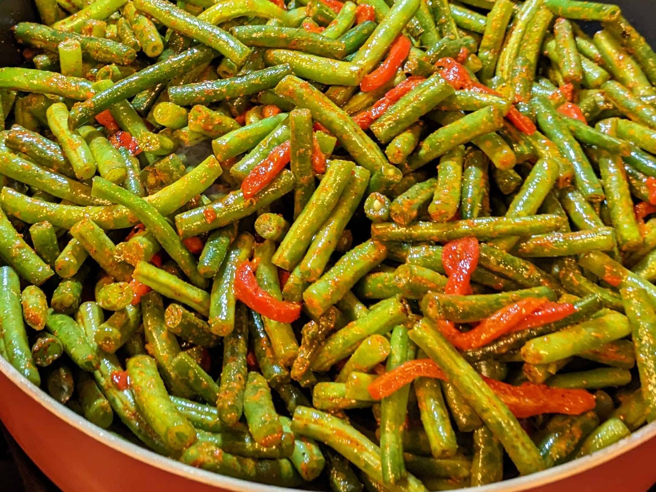 Green Beans with Garlic and Roasted Red Peppers in a pan