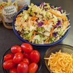 Tossed Salad with cheese, grape tomatoes, and salad dressings