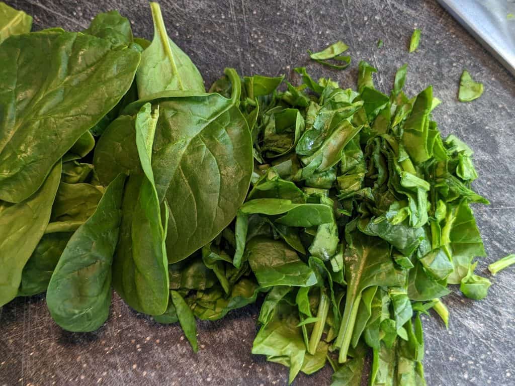 Spinach in the process of being chopped