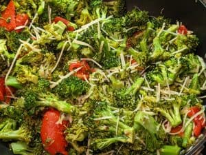 Broccoli, Roasted Red Peppers, and Parmesan cooking in pan