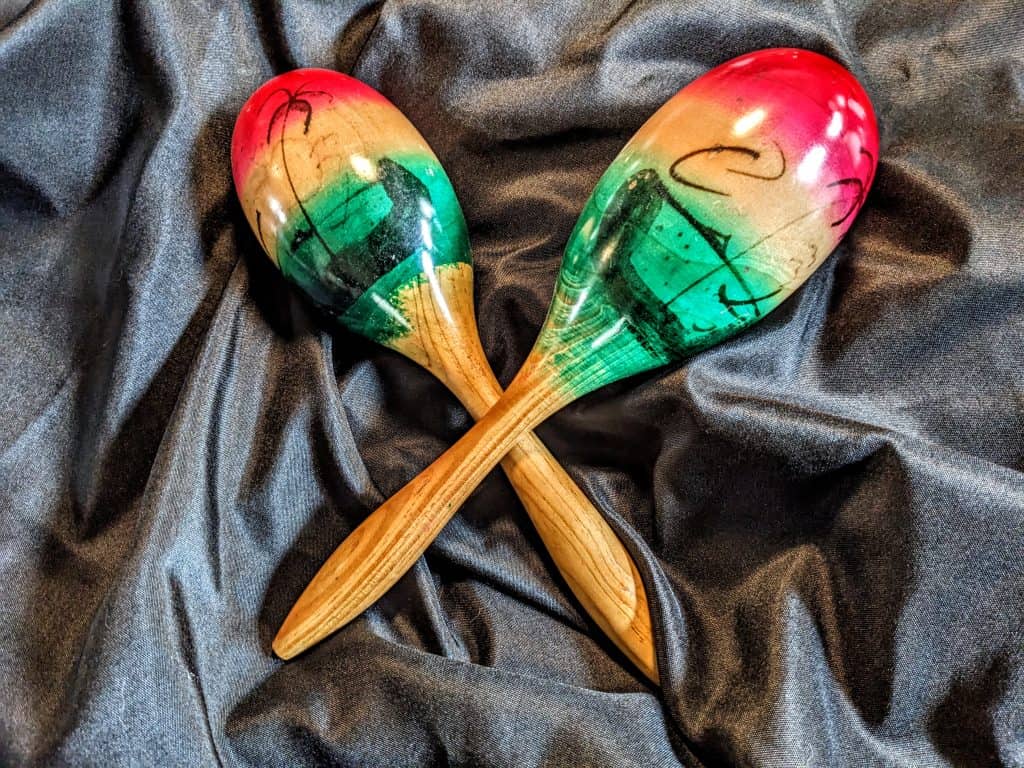 2 Maracas on a black background as decoration for Cinco de Mayo dinner party