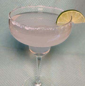 Easy Keto Margarita in Margarita Glass with Lime Wedge