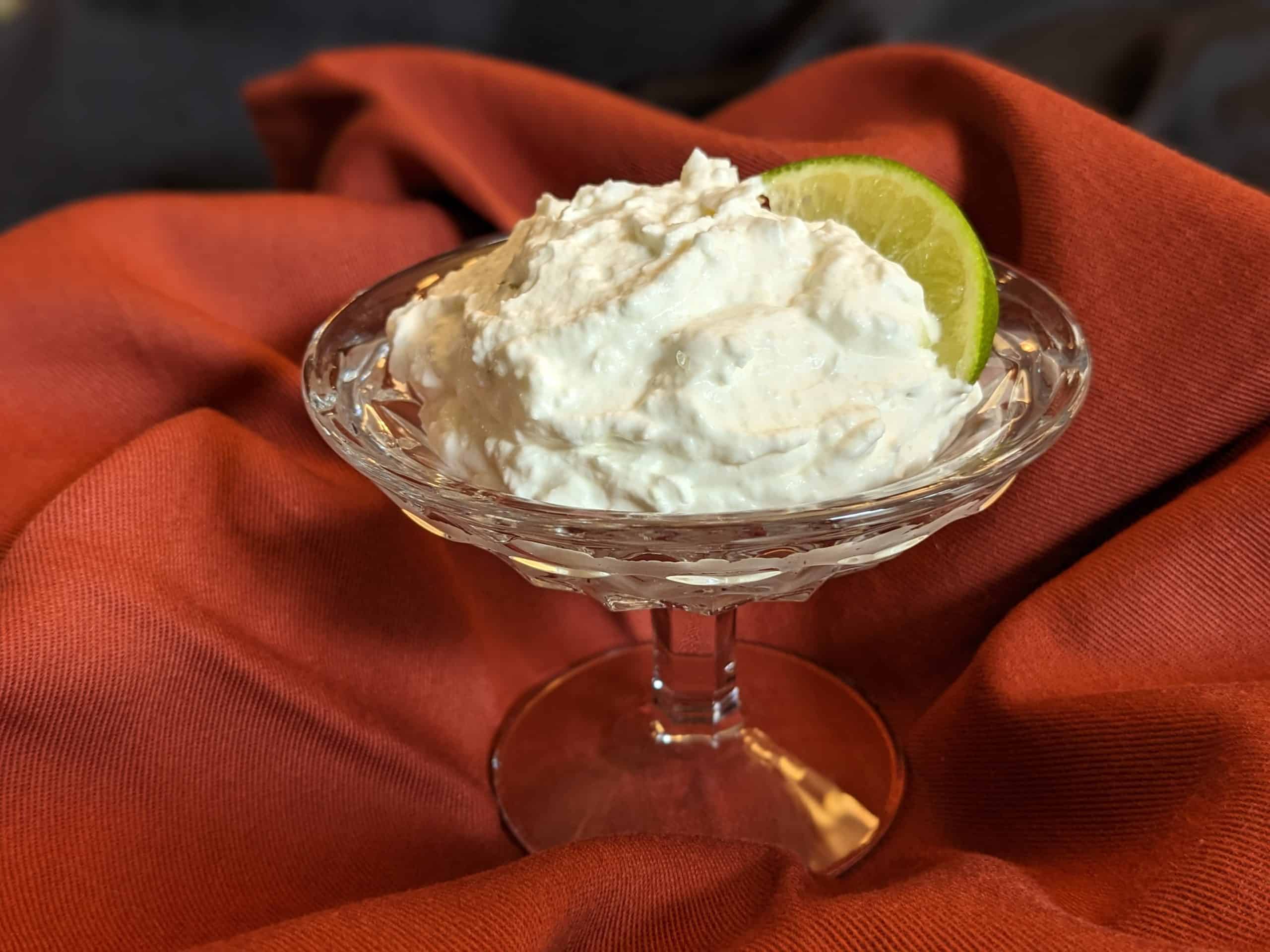 Margarita Mousse in an individual serving dish with a lime wedge