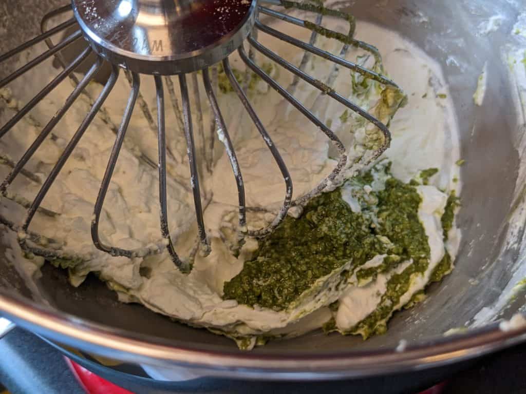 Whipped Pesto ingredients in stand mixer bowl