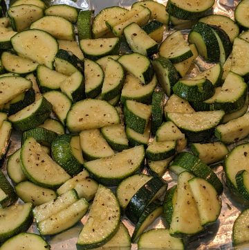 Easy Roasted Zucchini on rimmed baking sheet - finished