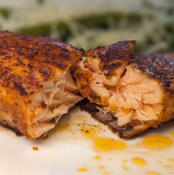 Easy Smoky Summer Salmon Filet on plate with asparagus in background