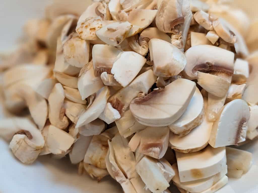 Raw white button mushrooms chopped