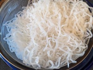 Shirataki Noodles in a fine mesh strainer