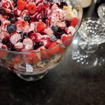 Keto Berry Trifle in Trifle Dish next to glass serving dishes