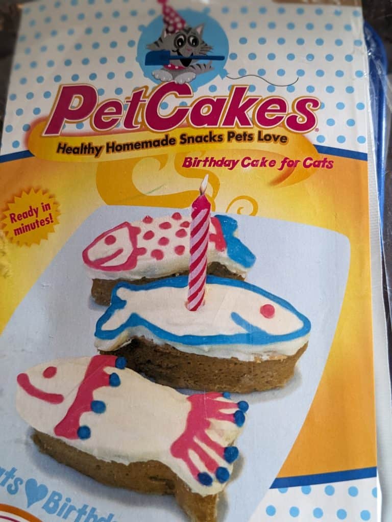 A package of cakes for cats shaped like fish for a cat birthday
