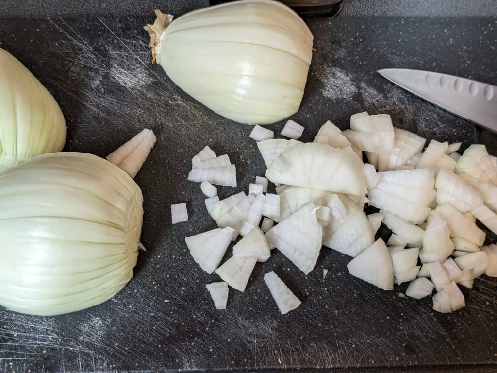 Chopping onions on a cutting board