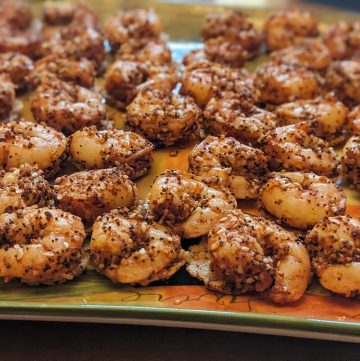 Everything Shrimp Bites on Parmesan Crisps arranged on a serving platter