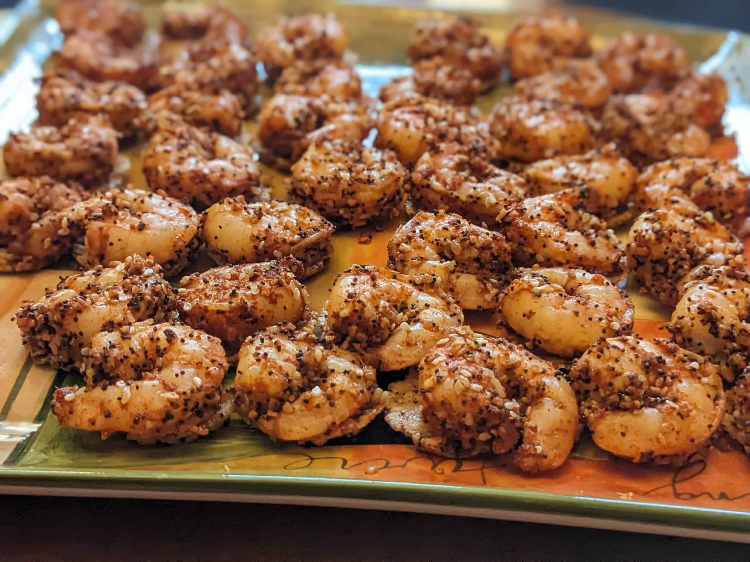 Everything Shrimp Bites on Parmesan Crisps arranged on a serving platter