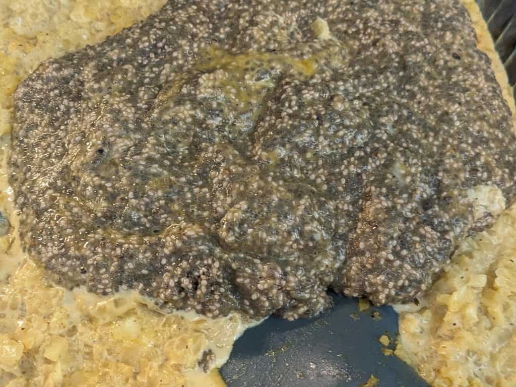 Mixing the cauliflower rice, eggs, and chia seeds for the Gorgonzola Cauliflower Chia Cakes
