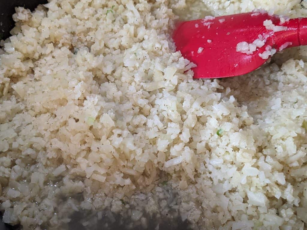 Cooking Cauliflower Rice in a pan