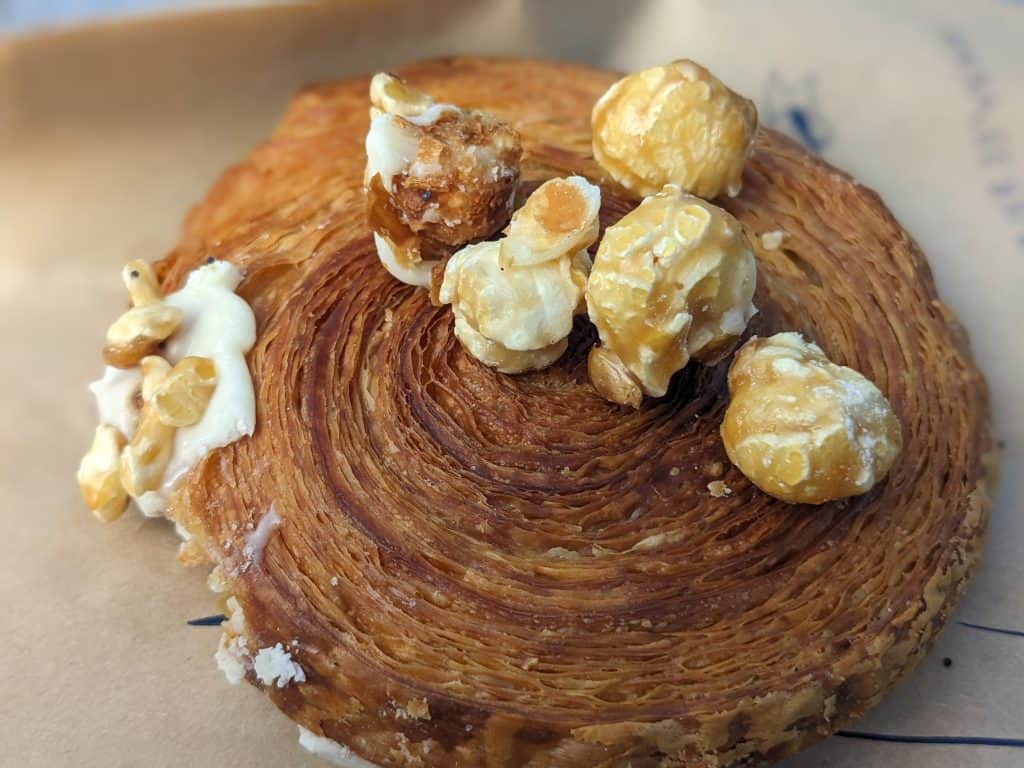 Caramel Sweet Corn Ba-sant - a cross between a croissant and a bagel filled with sweet corn flavored cream and topped with caramel corn