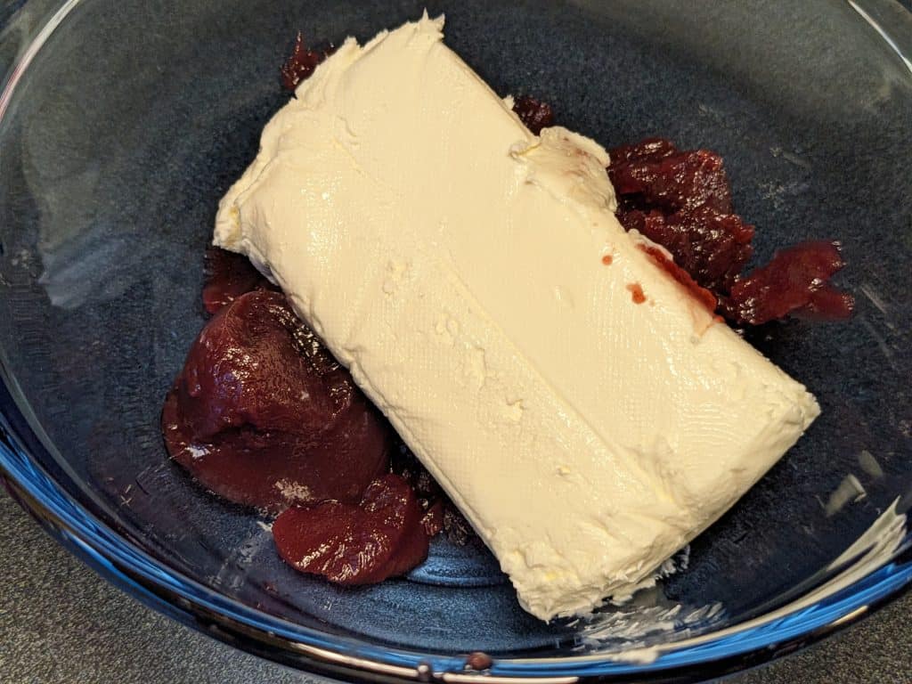 Ingredients for Monte Cristo Sauce in bowl - jam and cream cheese