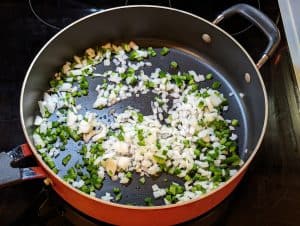 Sautéing Onions and Jalapeños in pan