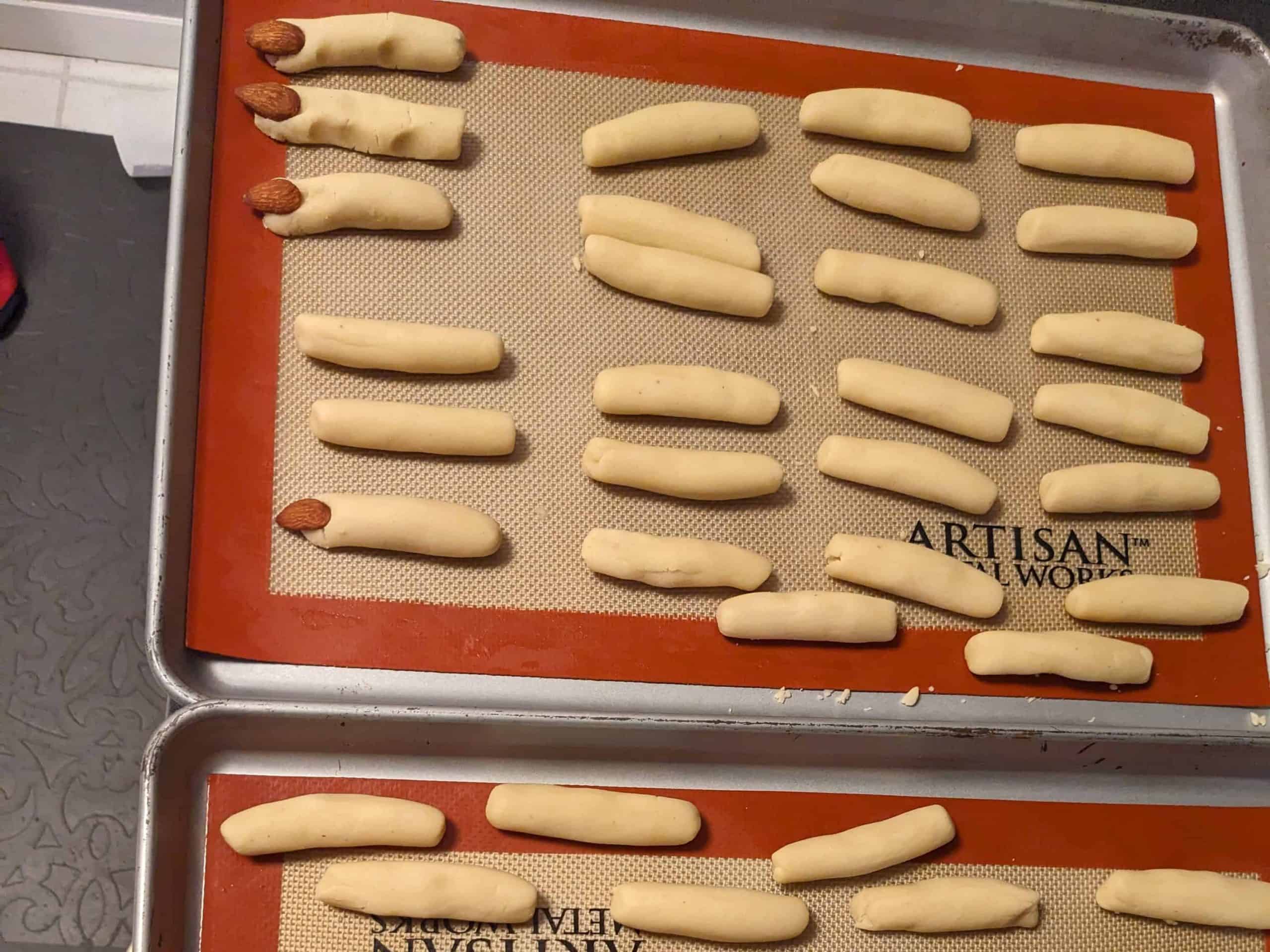 Dough cylinders for Keto Witch Finger Cookies before baking