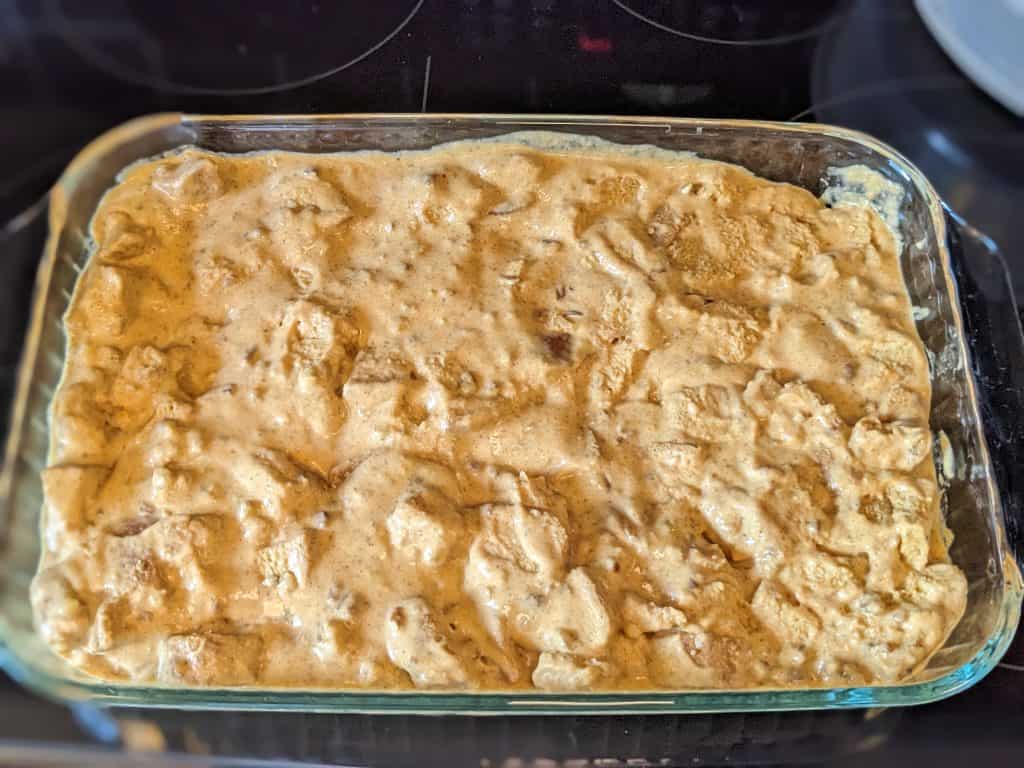 Unbaked Low Carb Pumpkin Bread Pudding in a casserole dish