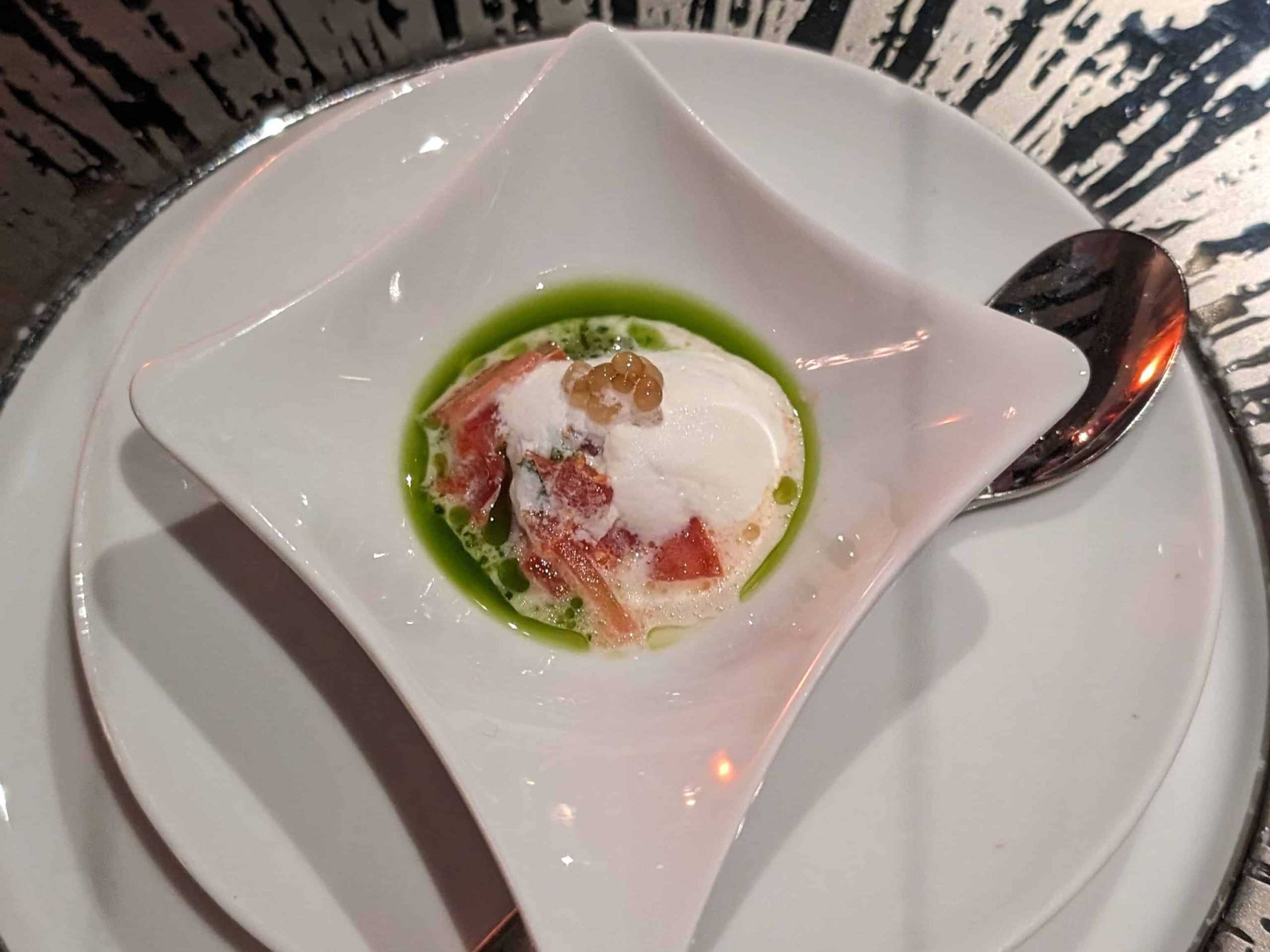 Amuse Bouche of Burrata Foam with Tomato Pieces and Pesto-infused Olive Oil