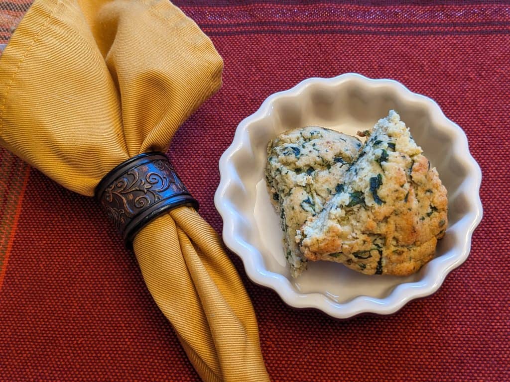 Keto Spinach and Artichoke Scones plated in a mini tart dish