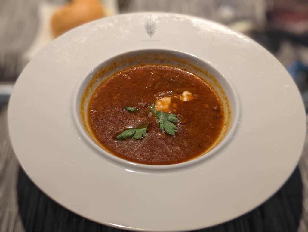 Borscht Soup with Braised Beef Short Rib, Beets, Cabbage, and Sour Cream