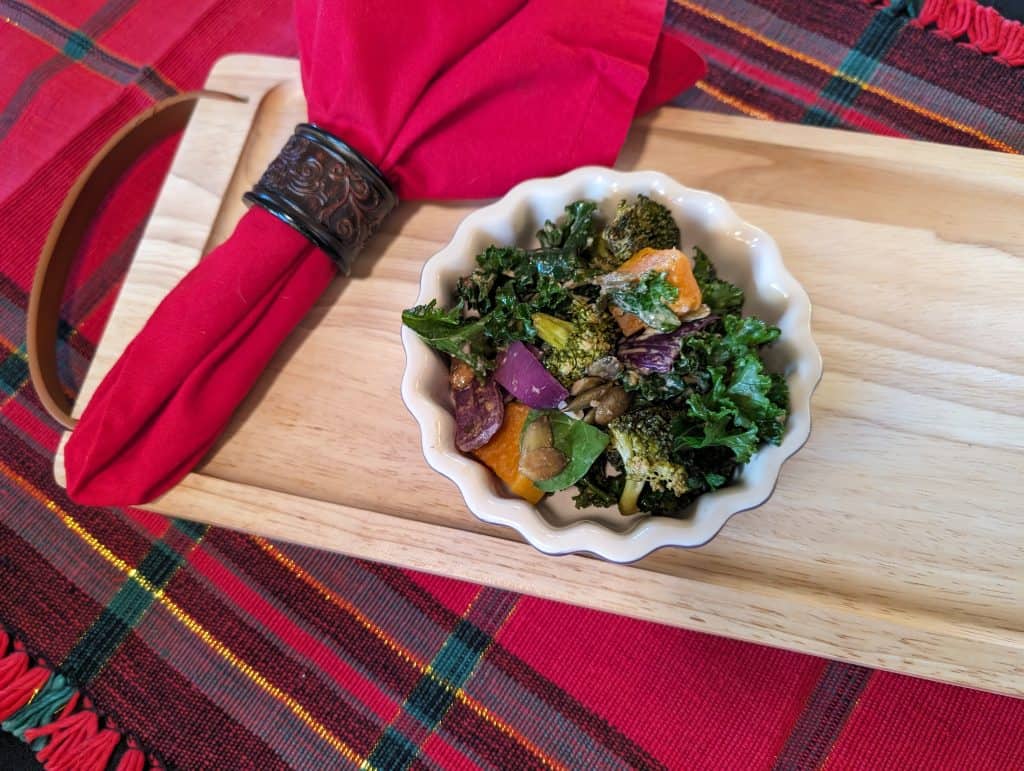 Butternut Squash, Broccoli, and Kale Salad with Roasted Garlic Dressing on a plate