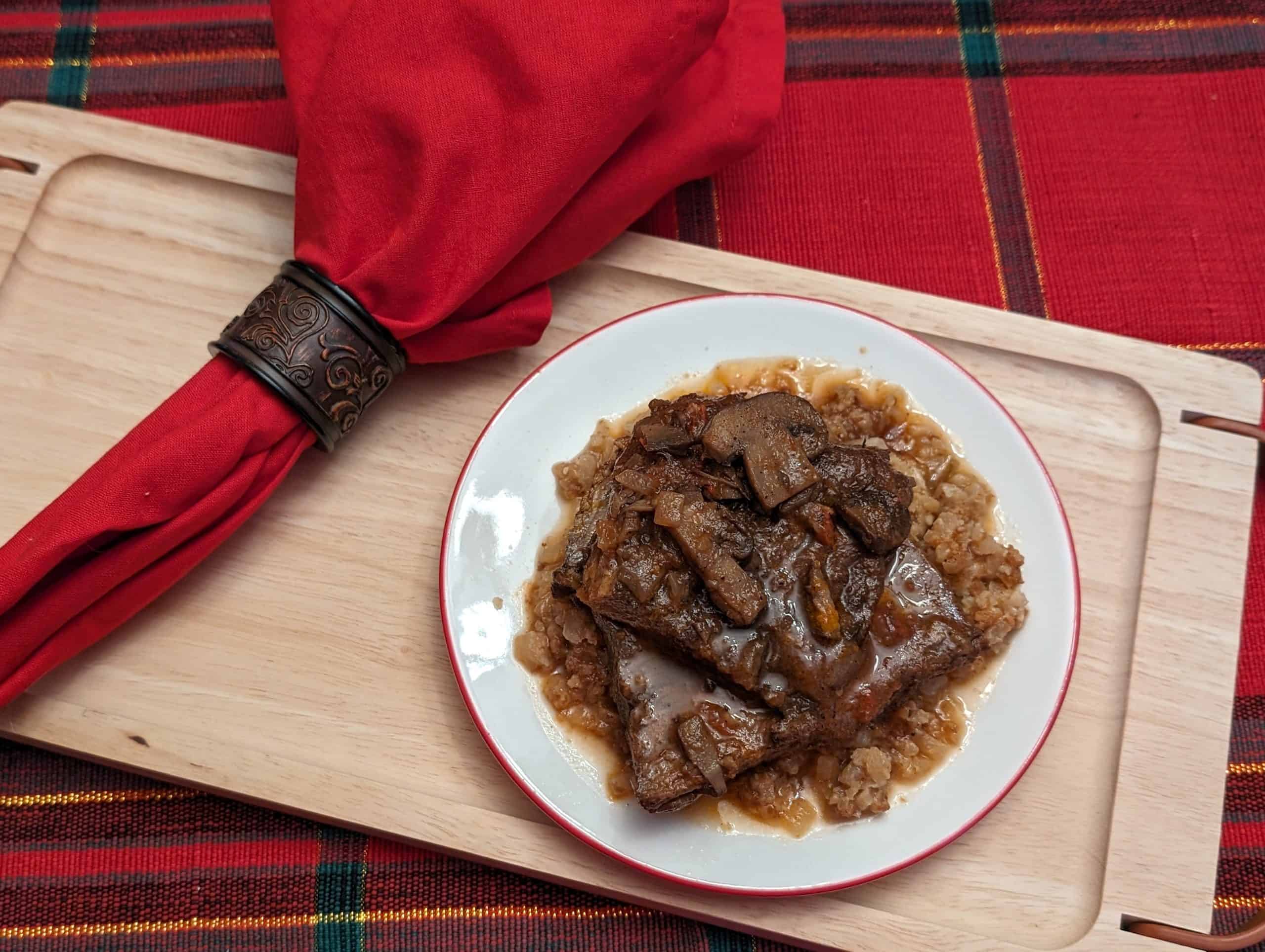 Easy Keto Pot Roast with Creamy Cauliflower Rice Risotto on a plate