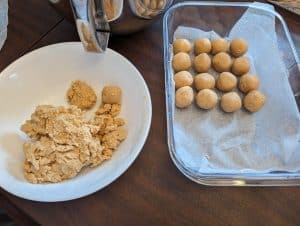 Sweet peanut butter centers for Keto Buckeyes with some rolled into balls