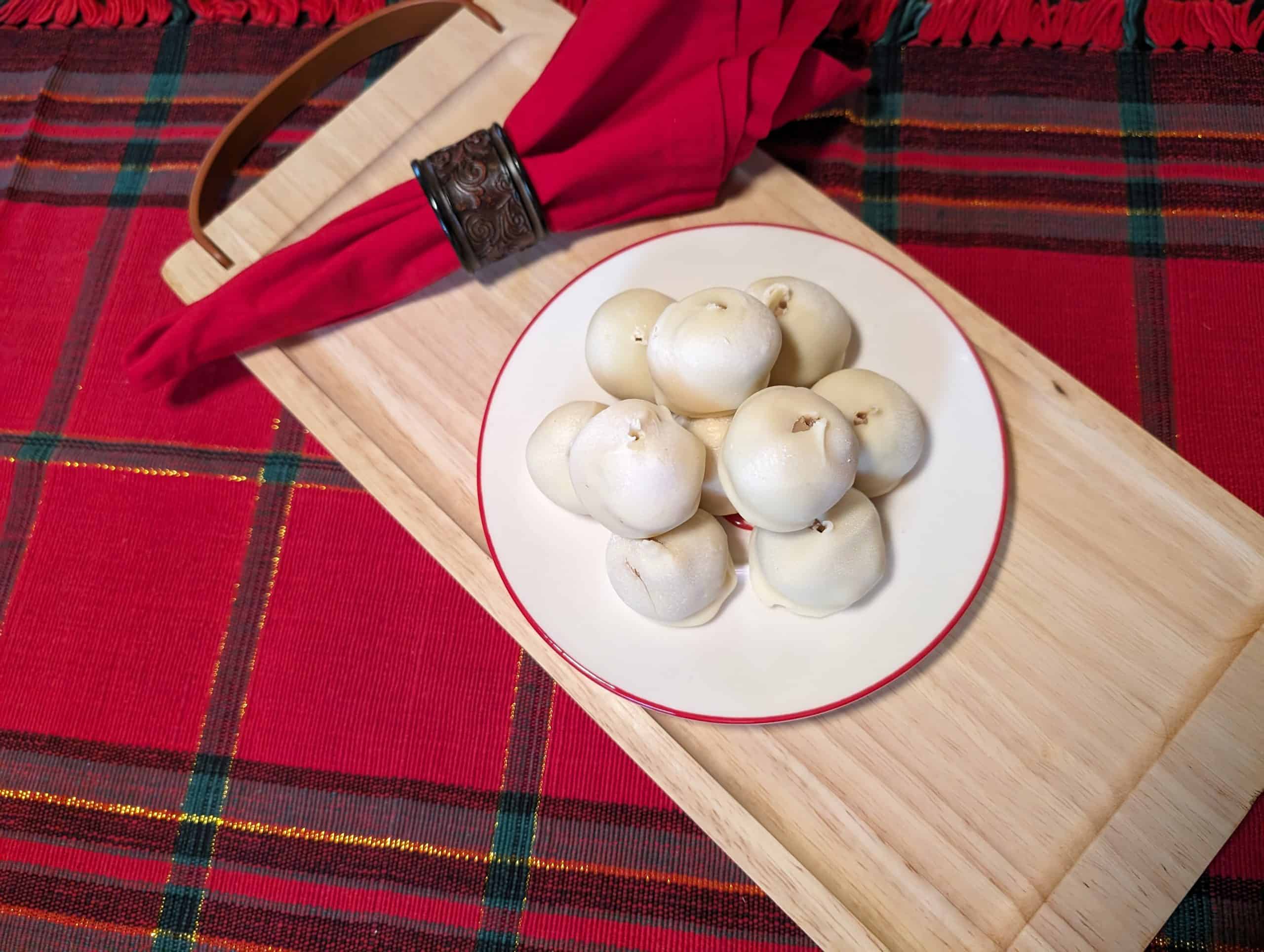 Keto Butterball Cookie Pops on a plate