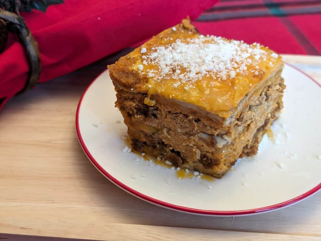 A slice of Pumpkin Sage Low Carb Lasagna on a plate from the side