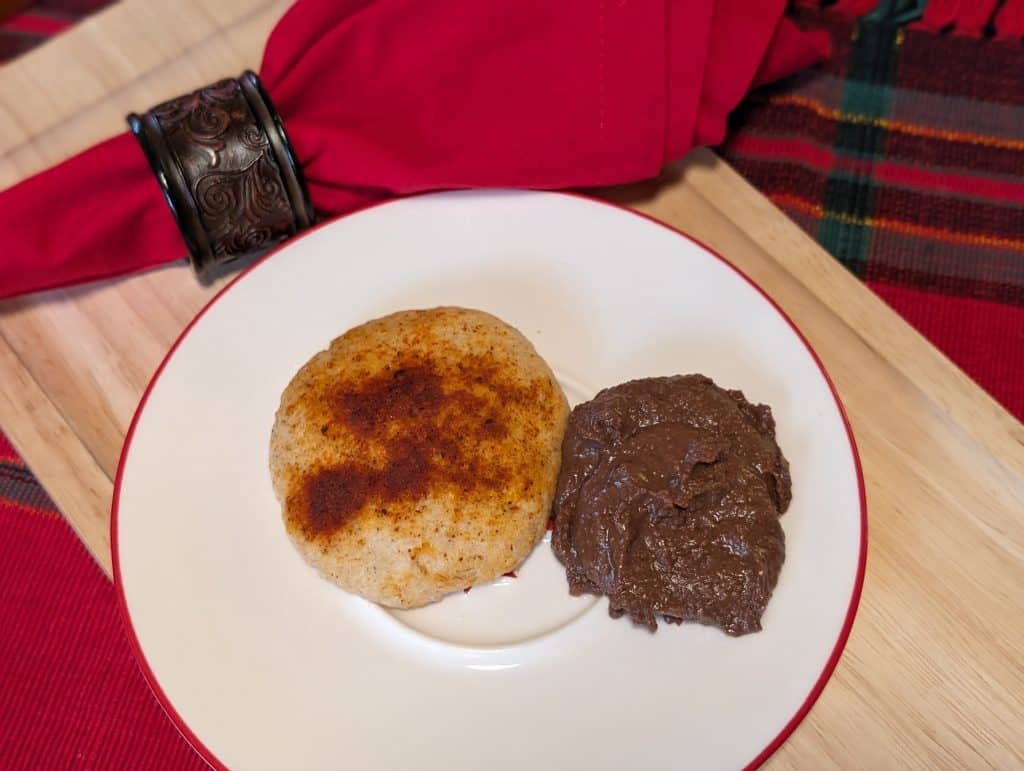 Sugar Free Chocolate Hazelnut Hummus on a plate with BBQ Dusted Keto Flatbread