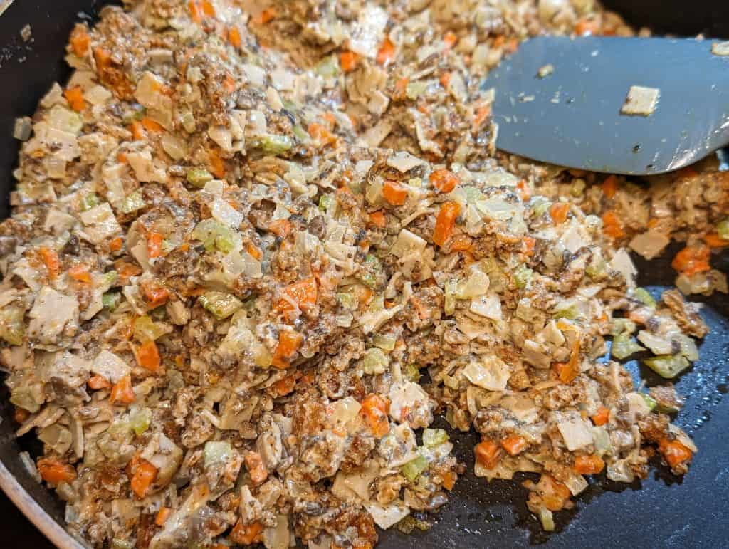 Stuffing mix for Keto Turkey and Dressing Stuffed Mushrooms in a pan