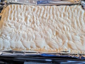 Keto Cake Mix on a baking sheet before a quick bake in the oven