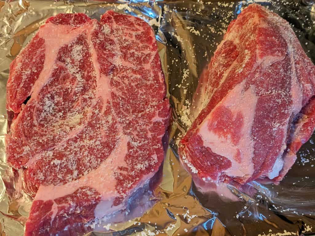 2 beef chuck roasts liberally rubbed with kosher salt