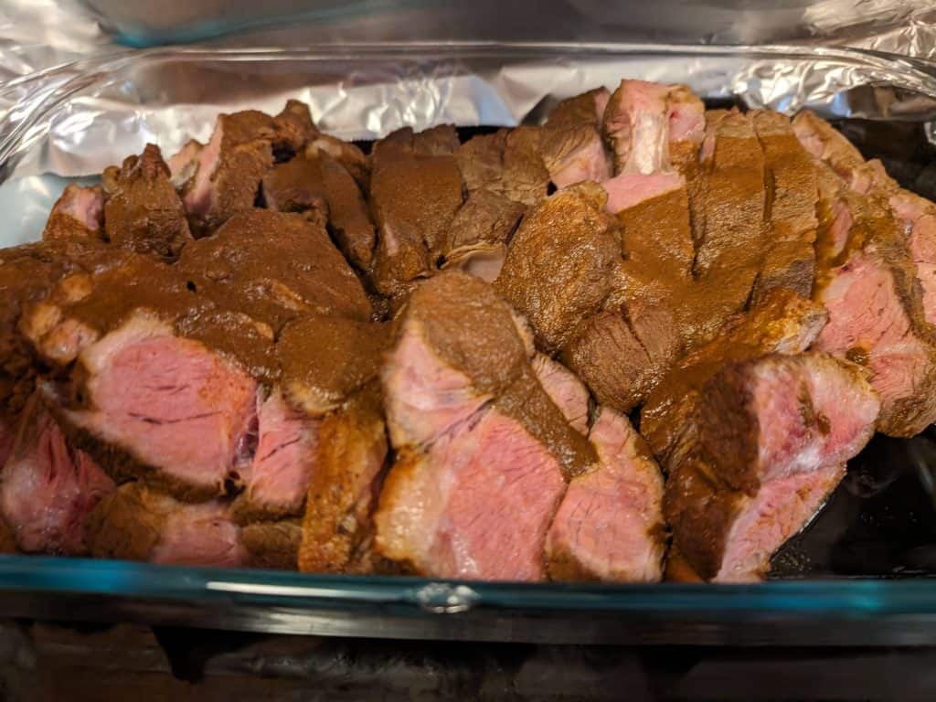 Slices of Savory Spiced Beef Roast in a dish