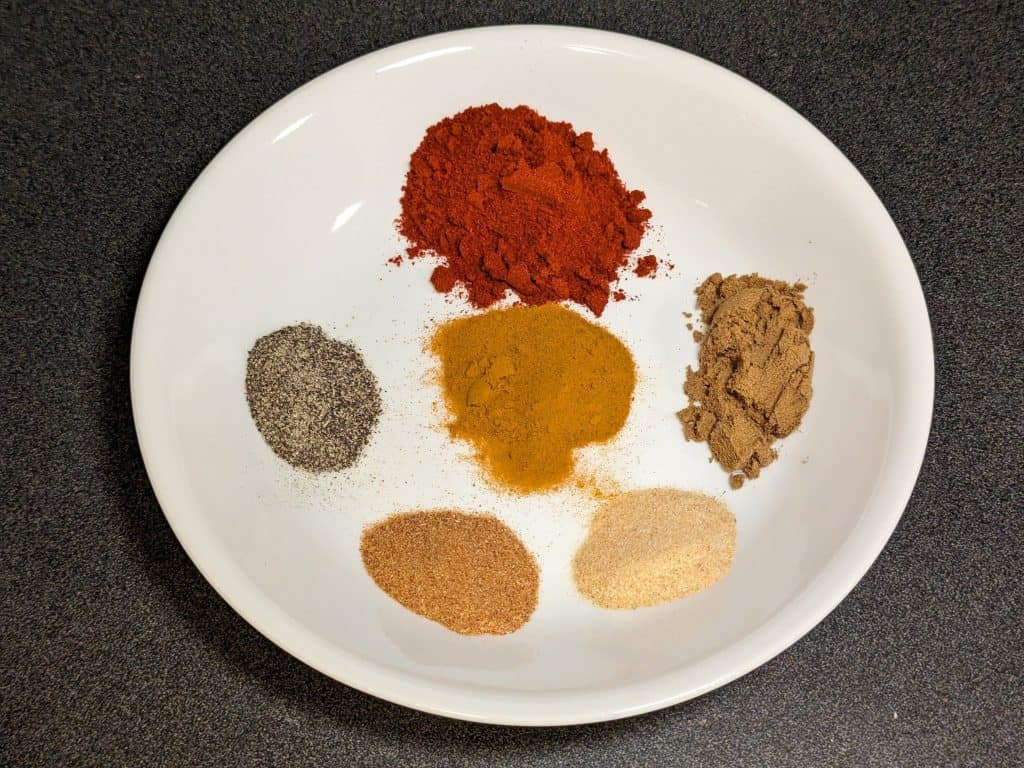 Spices for Savory Spiced Beef Roast - hot smoked paprika, cumin, garlic powder, onion powder, ground black pepper, and turmeric