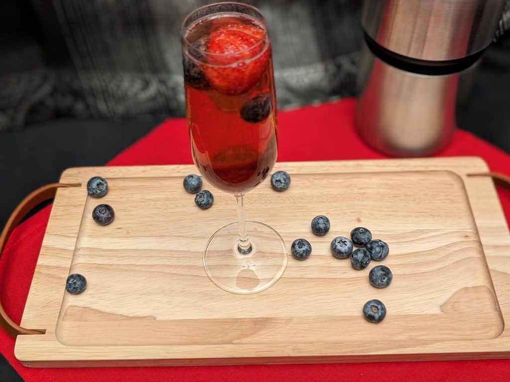 Berry Sparkling Wine Cocktail from a top down angle