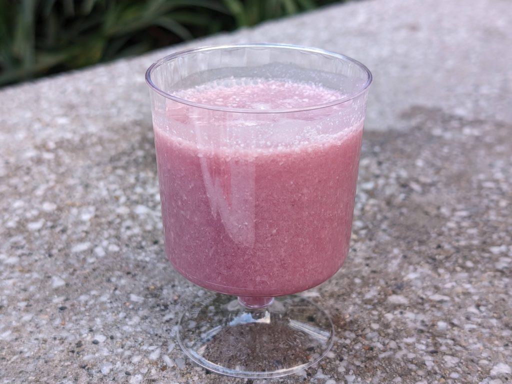 Blueberry and cream cocktail in a plastic wine glass