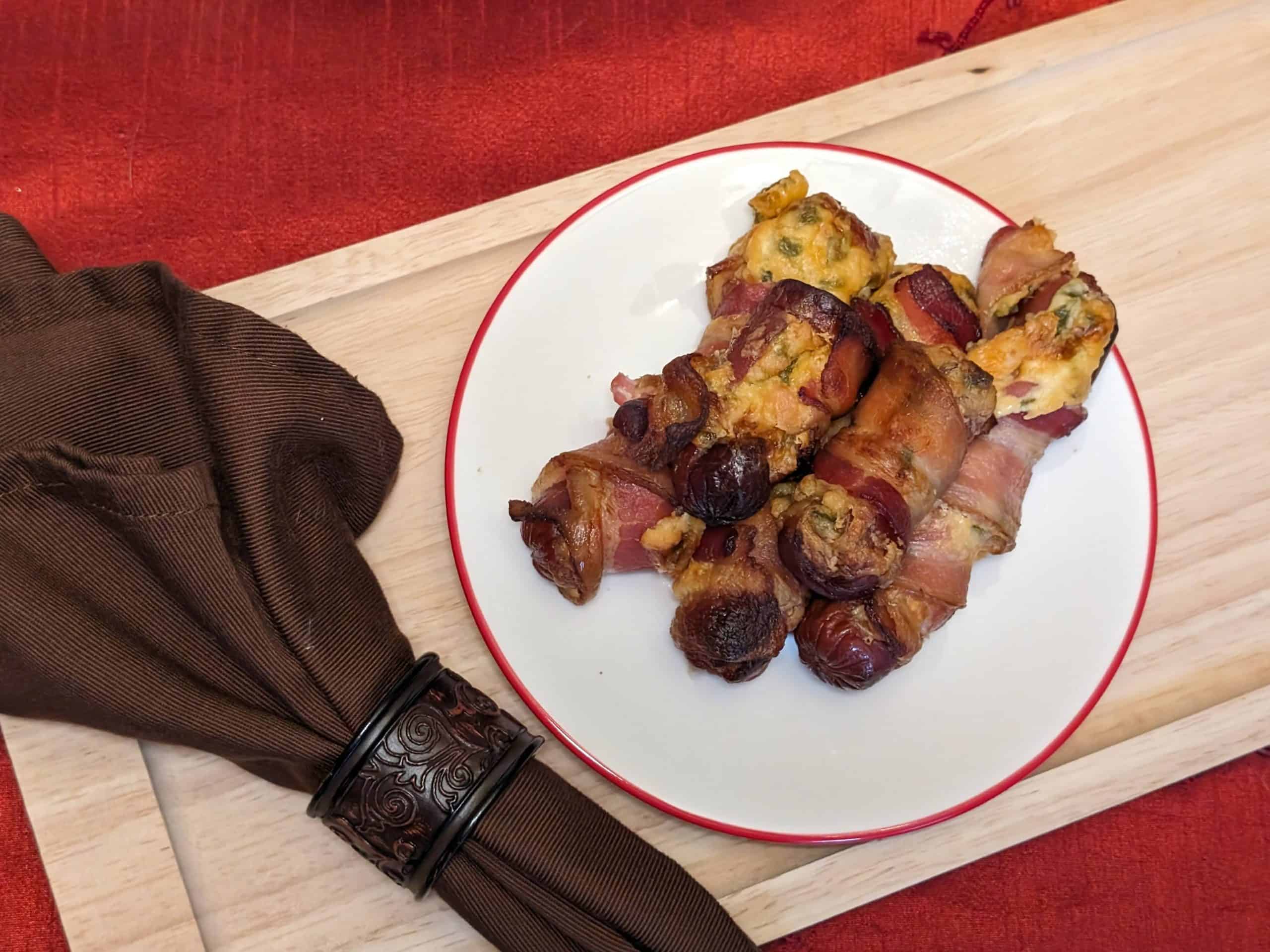 Bacon-Wrapped Stuffed Hot Dogs - plated close-up