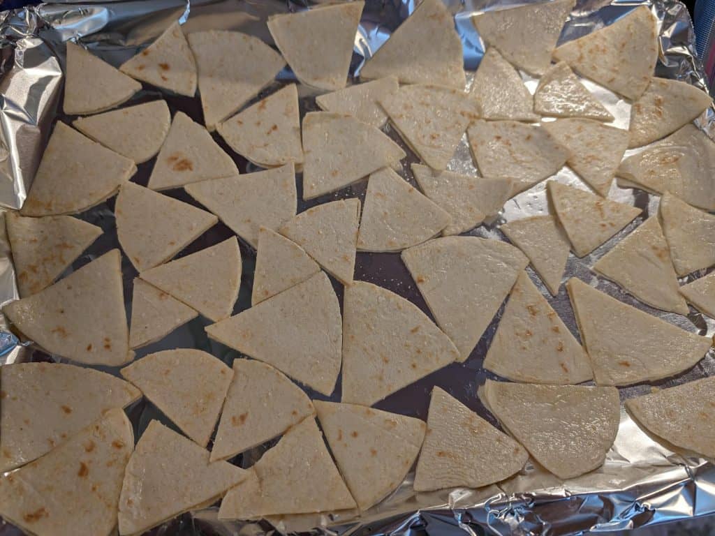 Easy Keto Pita Chips ready to bake on a rimmed baking sheet
