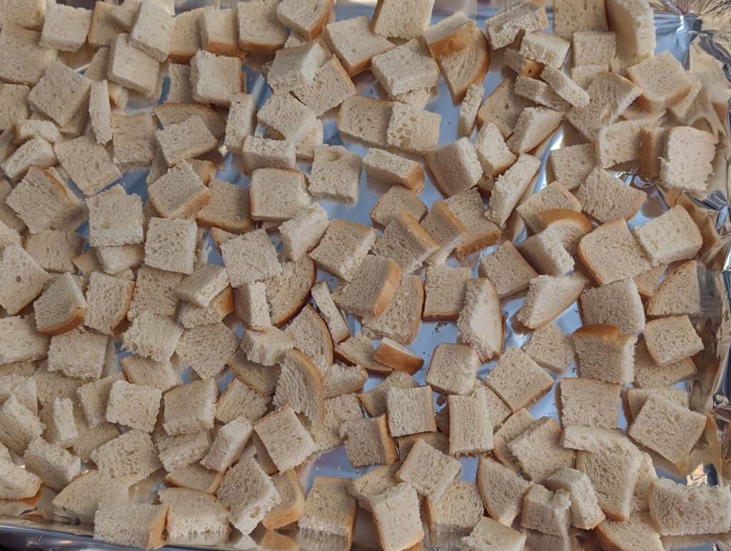 Dried Keto Bread Cubes on a rimmed baking sheet