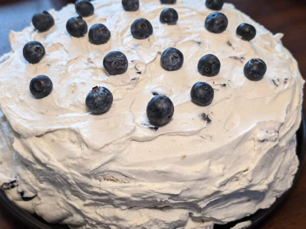 Keto Blueberry Spice Cake with Blueberry Mascarpone Frosting - whole cake, uncut