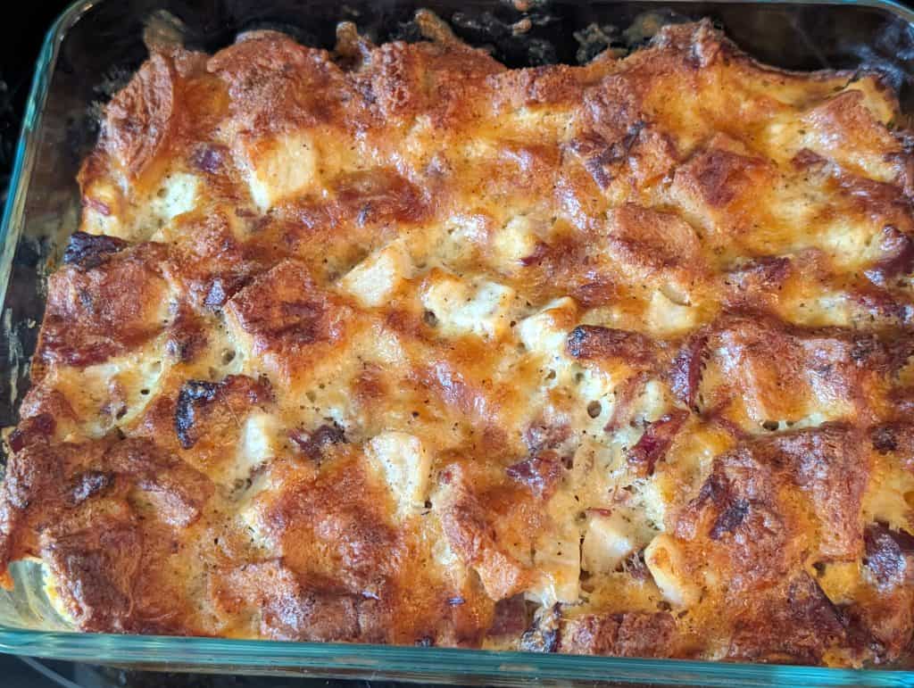 Keto Chicken Ham and Cheese Stuffing - baked and whole in casserole dish