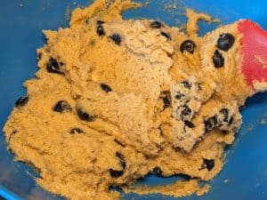 Cookie dough with blueberries folded in