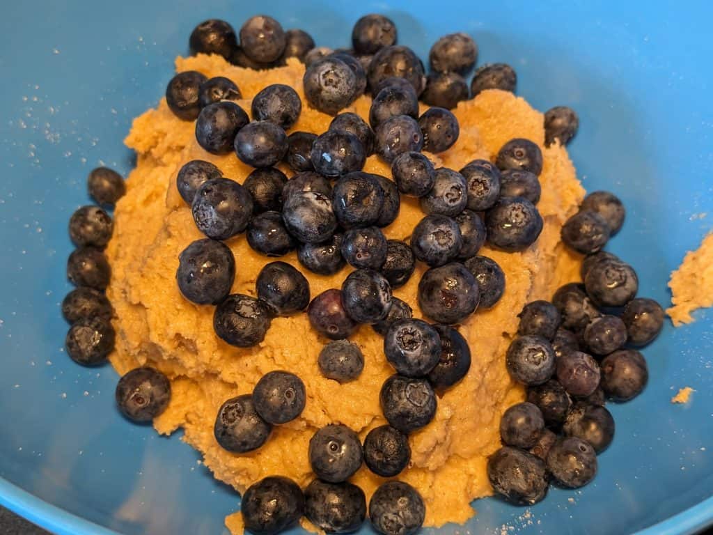 Cookie dough with blueberries not yet folded in
