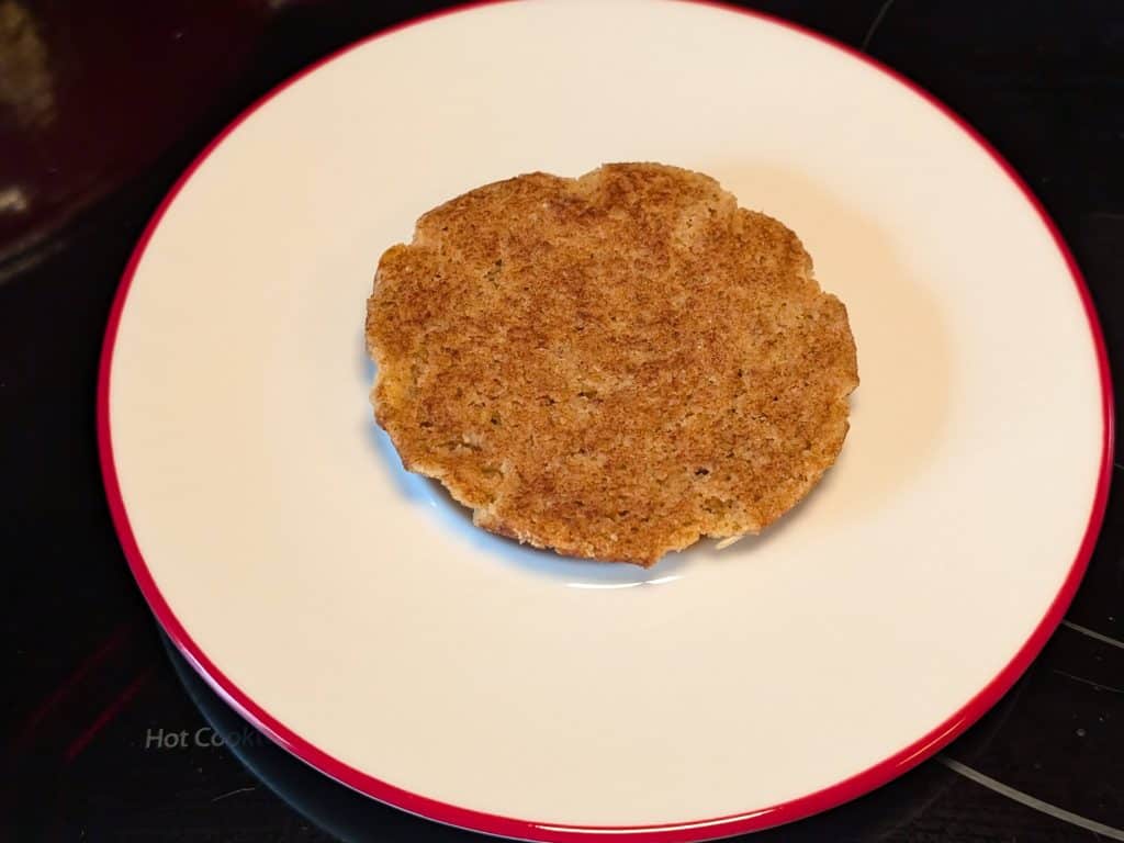 A plate with an upside down Keto Snickerdoodle Cookie as the 1st step in constructing a Keto Chipotle Ice Cream Sandwich