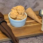 Small ramekin filled with Chipotle Keto Ice Cream with a keto ice cream cone next to it